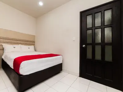 Cama o camas de una habitación en Hotel Río Puebla Centro