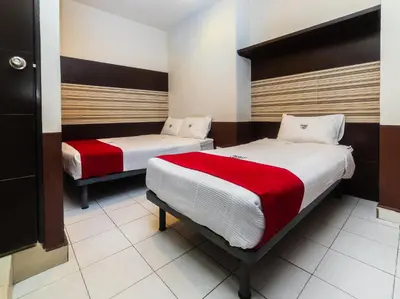 Cama o camas de una habitación en Hotel Río Puebla Centro