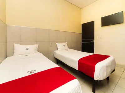 Cama o camas de una habitación en Hotel Río Puebla Centro