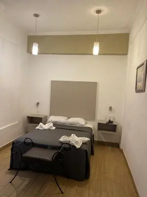 Cama o camas de una habitación en Hotel Palace Puebla