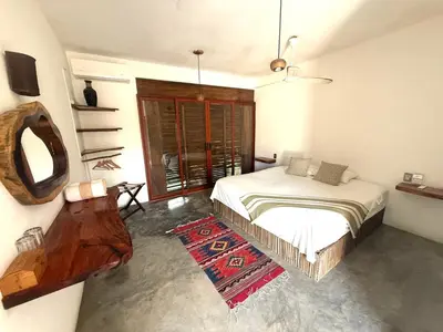 Cama o camas de una habitación en Bikini Beach House