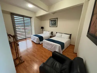 Cama o camas de una habitación en HOTEL TRUEBA
