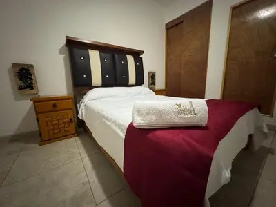 Cama o camas de una habitación en VILLA COSTERA HOTEL BOUTIQUE