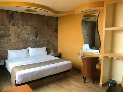 Cama o camas de una habitación en Hotel Jard Inn Adult Only