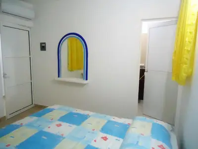 Cama o camas de una habitación en Hotel Olas Huatulco