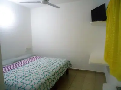Cama o camas de una habitación en Hotel Olas Huatulco