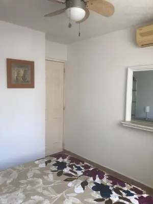 Cama o camas de una habitación en Renta de departamento en Acapulco Diamante