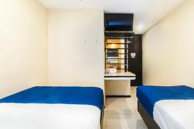 Cama o camas de una habitación en Hotel Kapu, Puebla