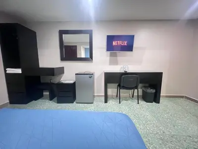 Cama o camas de una habitación en Hotel Casa-Noria Acapulco