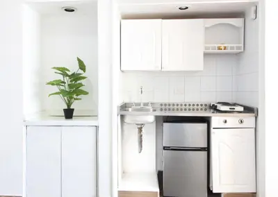 Una cocina o zona de cocina en Suites Torres Gemelas VIP