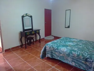 Cama o camas de una habitación en Hotel Cuaupatanini