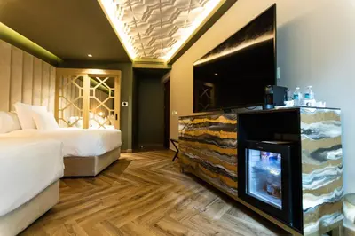 Cama o camas de una habitación en L Hotel Perla Boutique