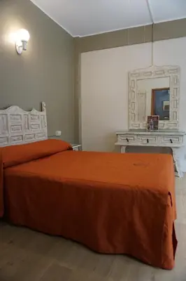 Cama o camas de una habitación en Hotel Palacio