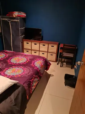Cama o camas de una habitación en Division del Norte Rooms