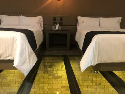 Cama o camas de una habitación en Hotel Isabel