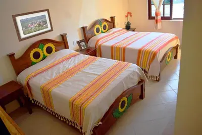 Cama o camas de una habitación en HOTEL SAN JUDAS