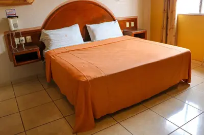 Cama o camas de una habitación en Motel Caribe