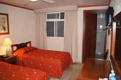 Cama o camas de una habitación en Hotel Veracruz