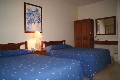 Cama o camas de una habitación en Hotel Veracruz