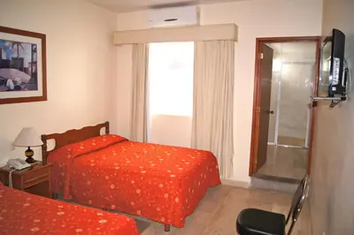 Cama o camas de una habitación en Hotel Veracruz