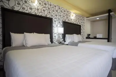 Cama o camas de una habitación en Hotel Ha