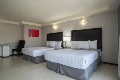 Cama o camas de una habitación en Hotel Ha