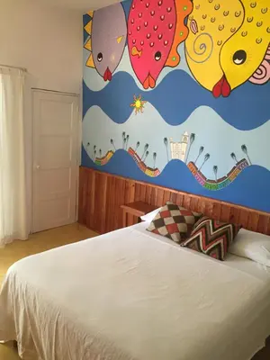 Cama o camas de una habitación en Casa De La Luz - Guesthouse