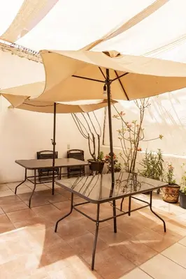Un patio o zona al aire libre en Hermoso departamento en Oaxaca con estacionamiento