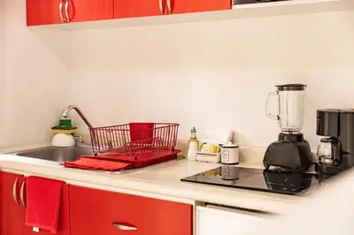 Una cocina o zona de cocina en Hermoso departamento en Oaxaca con estacionamiento