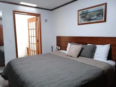 Cama o camas de una habitación en Hotel La Aurora Like Home