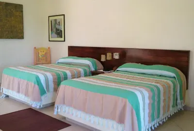 Cama o camas de una habitación en Hotel Casa Pan de Miel (Only Adults)