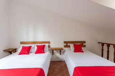 Cama o camas de una habitación en Hotel Paraje Casa Blanca