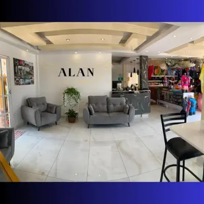 Zona de estar de Hotel y Cabañas Alan