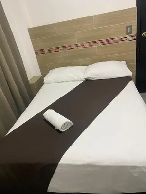 Cama o camas de una habitación en DON CELES