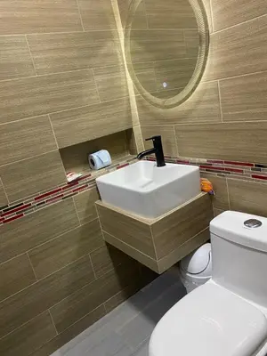 Un baño de DON CELES