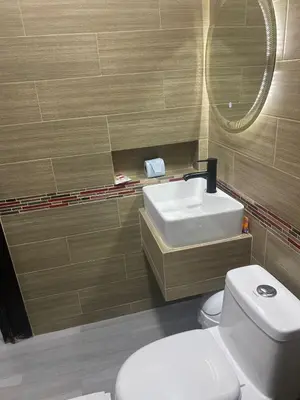 Un baño de DON CELES