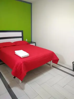 Cama o camas de una habitación en Hotel del Rosario