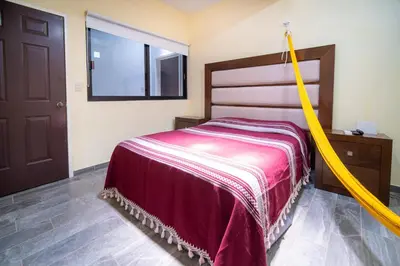 Cama o camas de una habitación en Casa nueva y moderna en Juchitán
