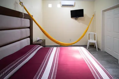 Cama o camas de una habitación en Casa nueva y moderna en Juchitán