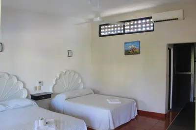Cama o camas de una habitación en Hotel Albatros