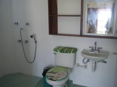 Un baño de Casa Colibrí Agua Blanca