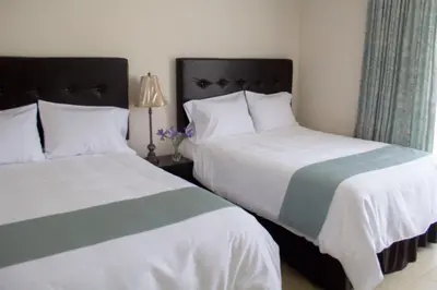 Cama o camas de una habitación en Hotel Nube Nueve