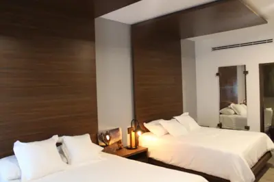 Cama o camas de una habitación en Hotel Diana