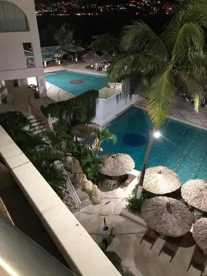 Piscina en o cerca de Hermosa Suite Torres Gemelas