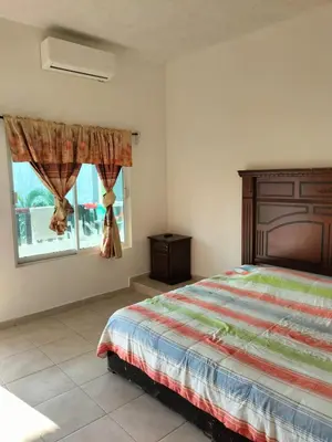 Cama o camas de una habitación en Hotel Villas Yoleth