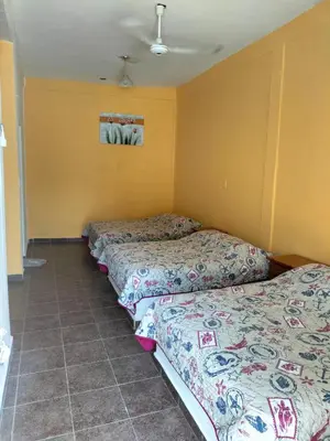 Cama o camas de una habitación en Hotel Villas Yoleth
