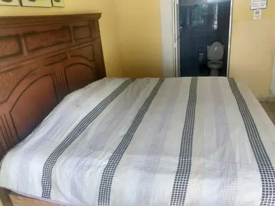 Cama o camas de una habitación en Hotel Villas Yoleth