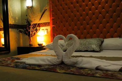 Cama o camas de una habitación en Villas y Suites Paraiso del Sur