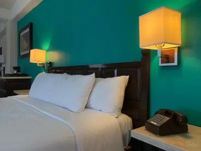 Cama o camas de una habitación en Hotel Santa Fe