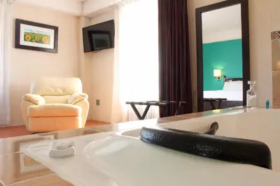 Cama o camas de una habitación en Hotel Santa Fe